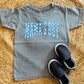 Checkered Mama’s Boy Tee