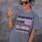 Suspect Claims She Listens Tee