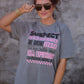 Suspect Claims She Listens Tee