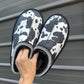 Cow print bruin slippers