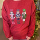 Crimson Sequin Nutcracker Corded Crew