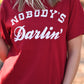 Nobody’s Darlin’ Tee