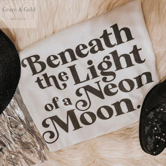 Beneath the Light of a Neon Moon
