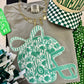 GREEN FLORAL HELMET TEE