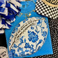 BLUE FLORALS FOOTBALL TEE