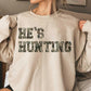He's hunting tee or sweatshirt